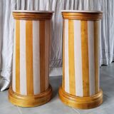 A pair of distressed bedside tables.