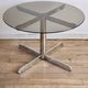 Glass and steel table attributed to Florence Knoll, Roche Bobois edition, 1970s.
