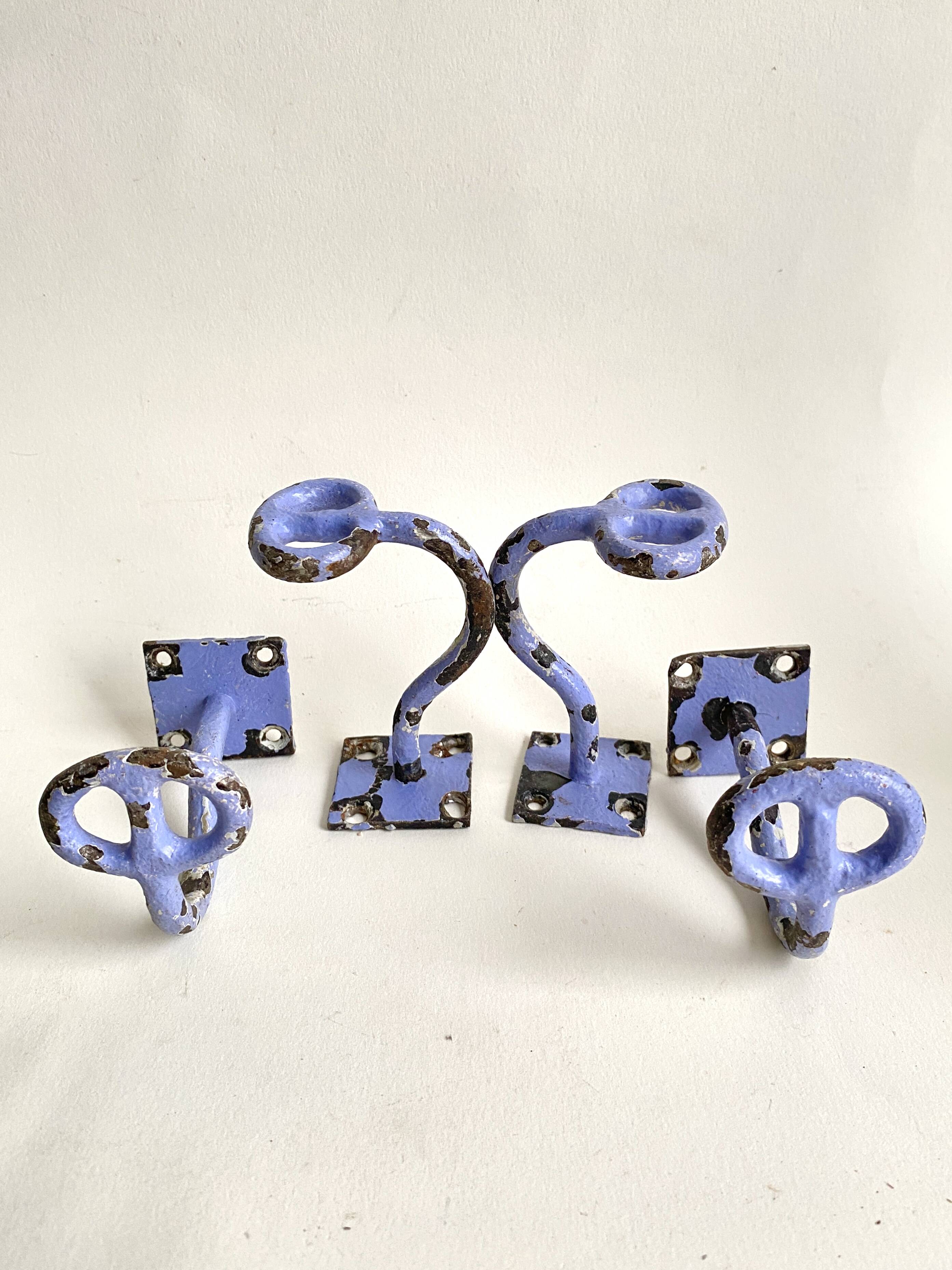 Set of painted cast iron industrial coat hooks