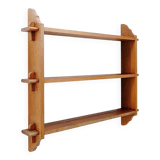 Wall shelves with dowels in Arts & Crafts style