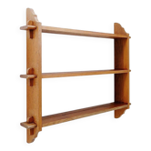 Wall shelves with dowels in Arts & Crafts style