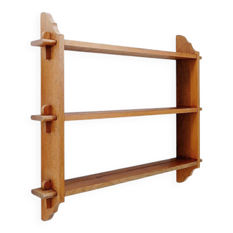Wall shelves with dowels in Arts & Crafts style