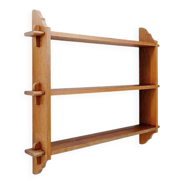 Wall shelves with dowels in Arts & Crafts style