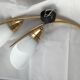 Pair of 60's gilded appliques 2 white conical lights