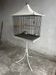 Vintage pagoda-style birdcage on a stand