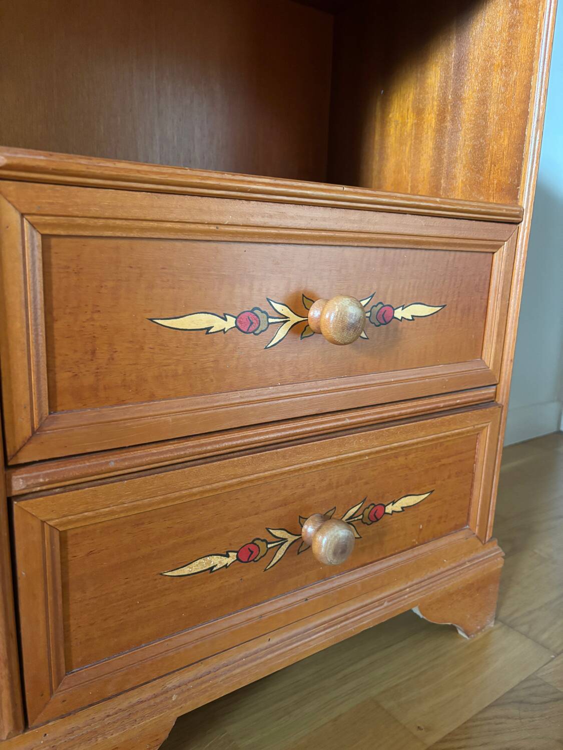 Vintage bedside table with floral decor