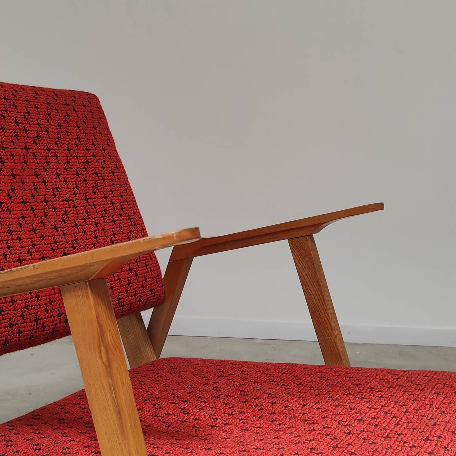 Pair of armchairs in mottled red and wood by Uluv, former Czechoslovakia 1960