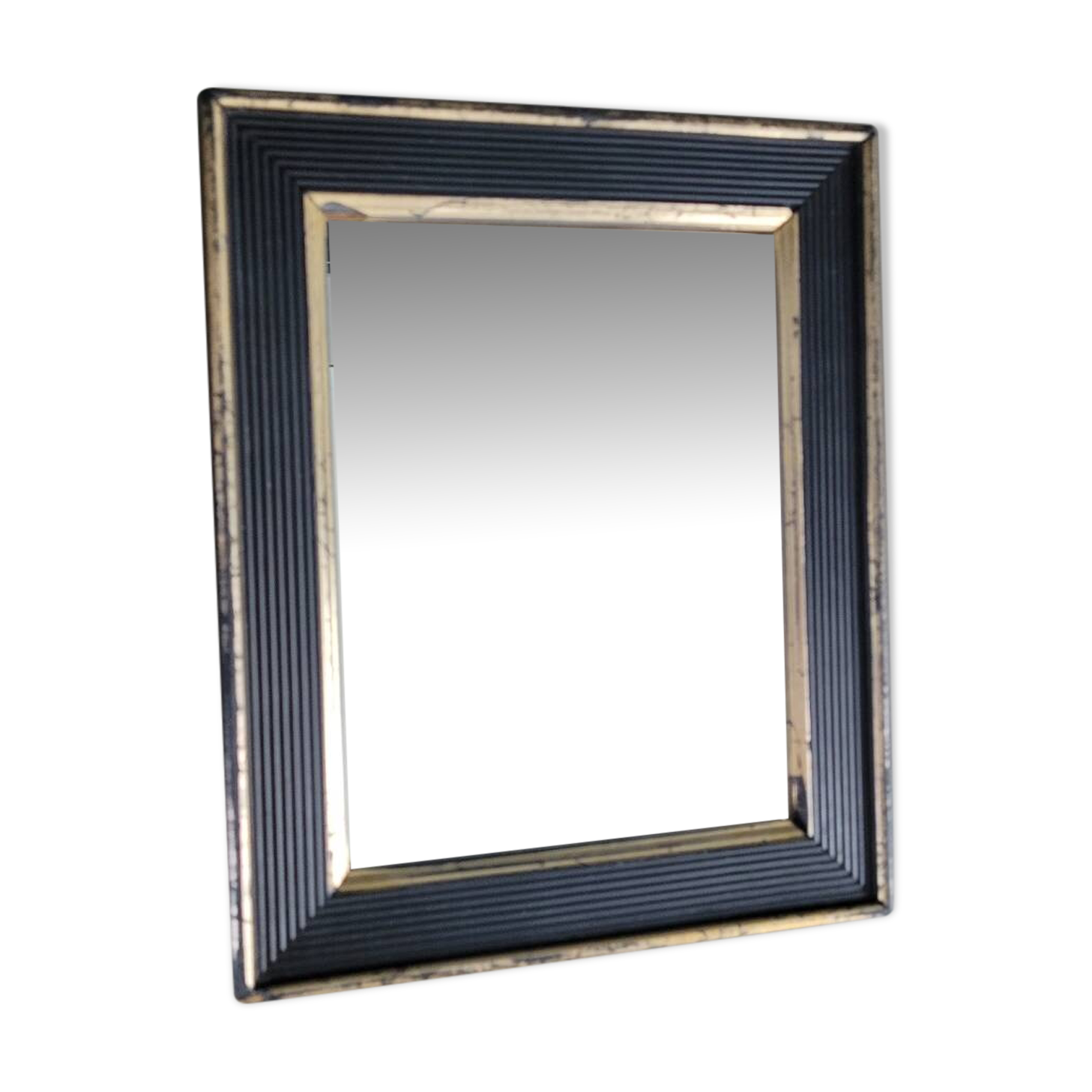 Antique black and gold wooden mirror