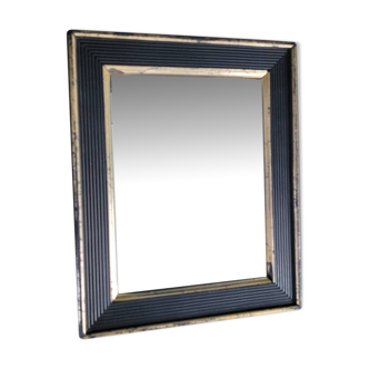 Antique black and gold wooden mirror