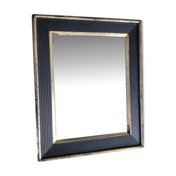 Miroir ancien en bois noir et or