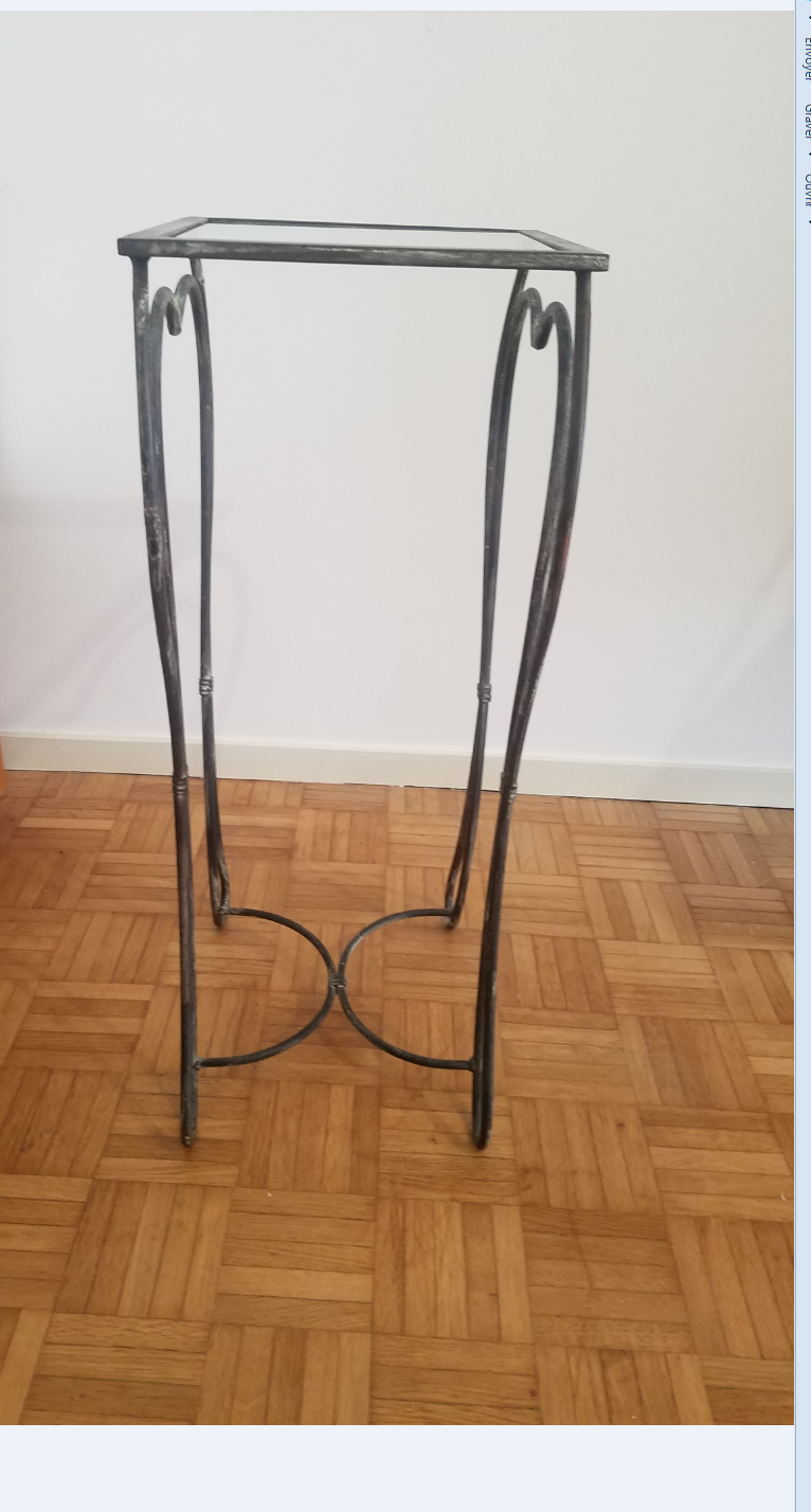 Wrought iron pedestal table