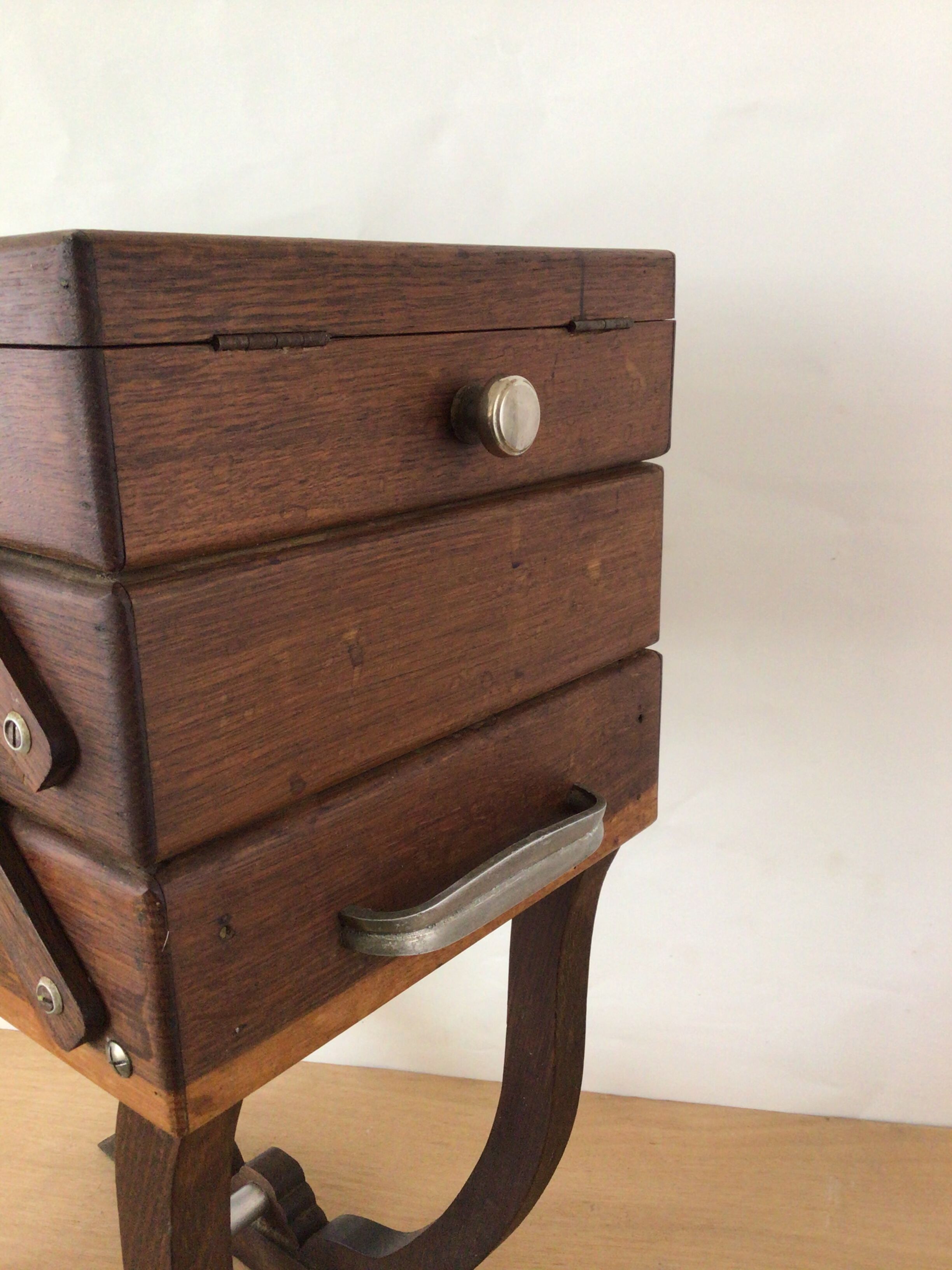 Worker on wooden feet