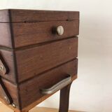 Worker on wooden feet