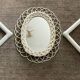 Rattan entrance set with mirror and 2 coat hooks.