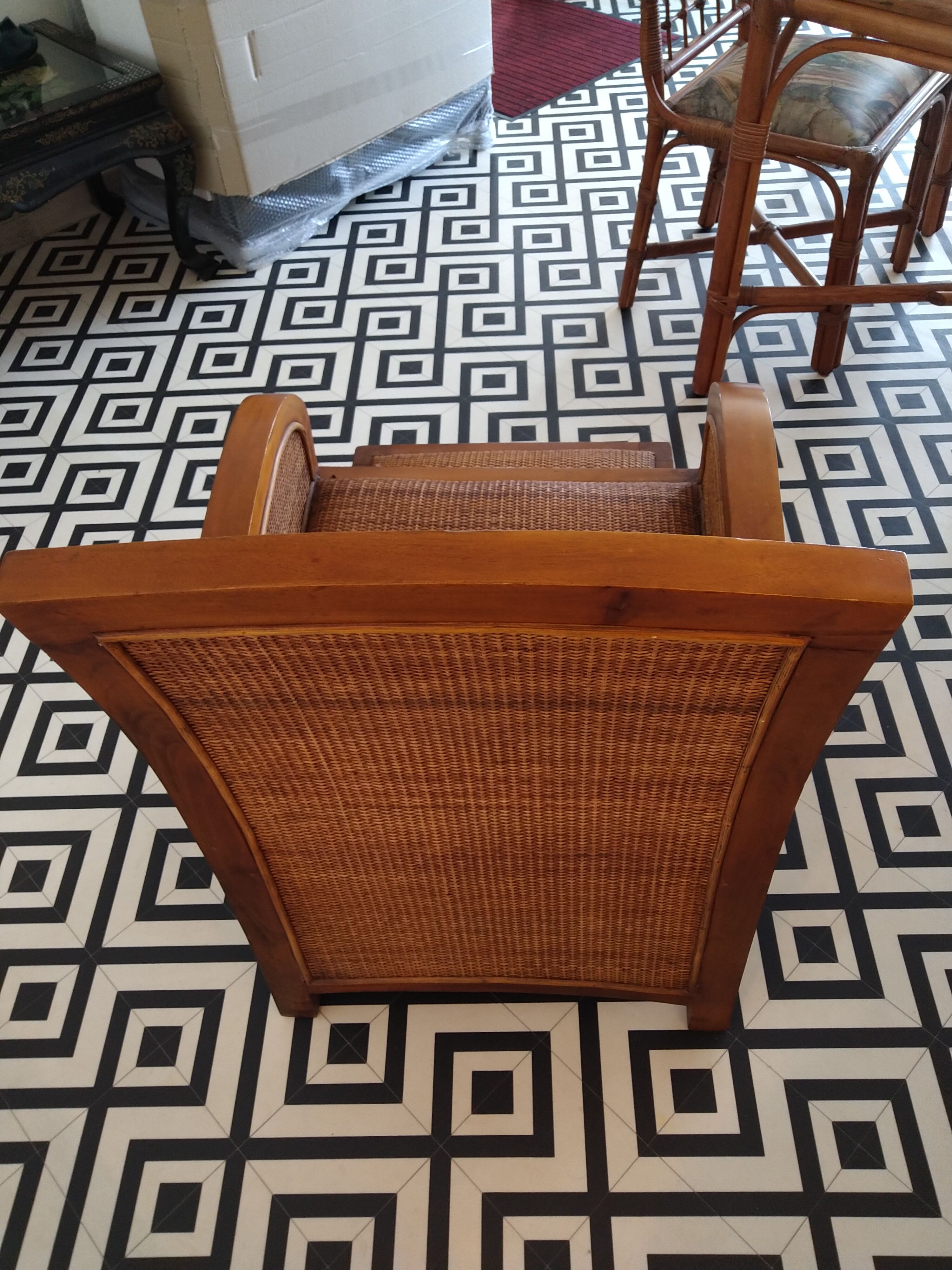 Colonial rattan armchair with ottoman