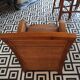 Colonial rattan armchair with ottoman