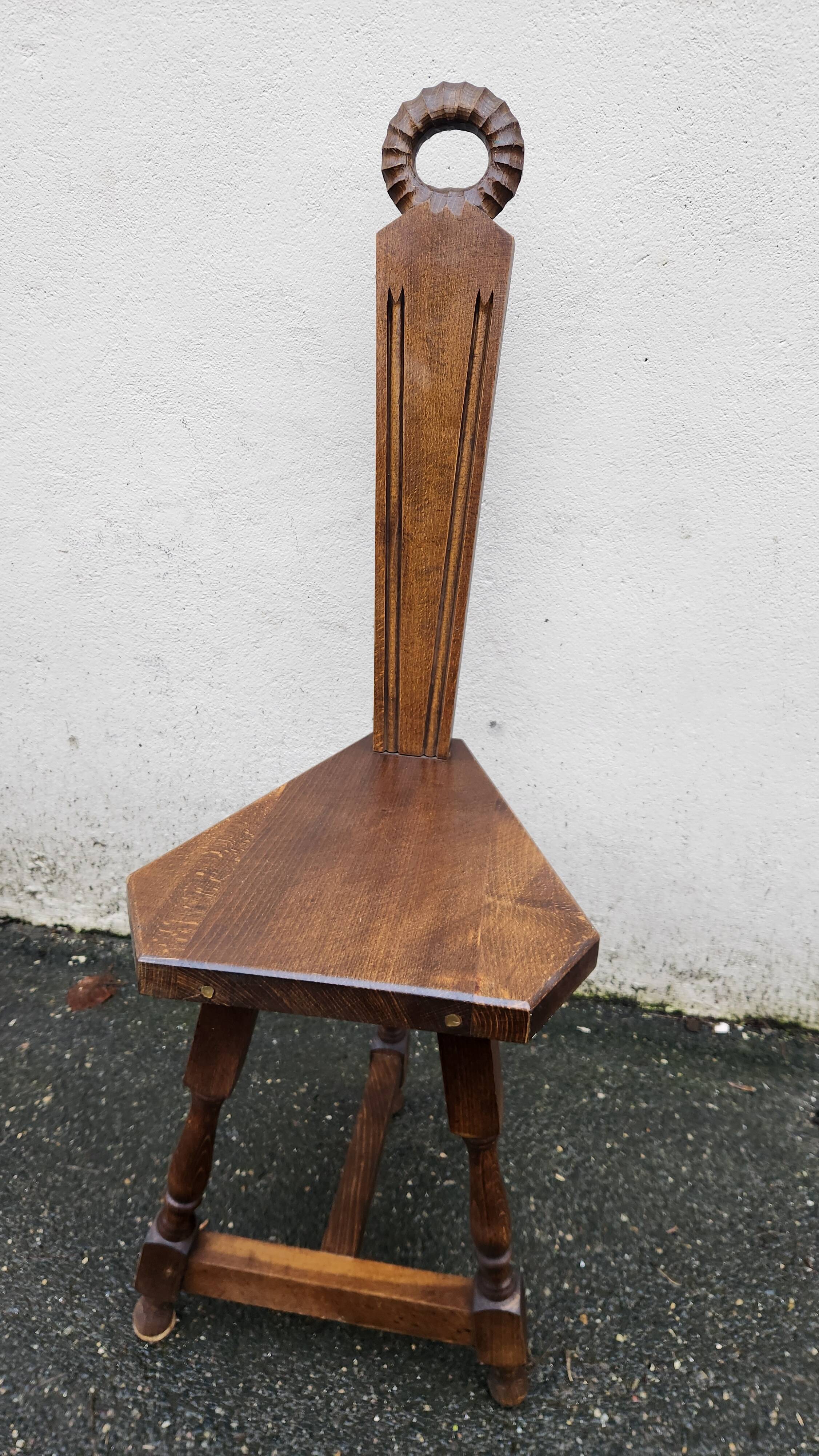 2 three-legged chairs made of solid wood