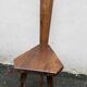 2 three-legged chairs made of solid wood