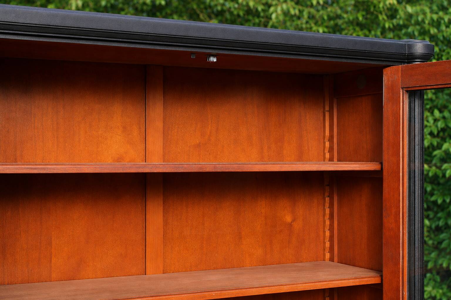 Renovated black antique Louis XVI style display cabinet, glass-fronted bookcase.