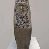 Vase with blue and white enamel on terracotta