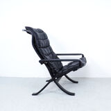 Westnofa black leather Flex armchair with ottoman