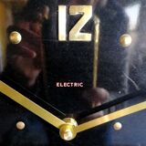 Vintage formica silent rectangular wall clock "Electric golden black"