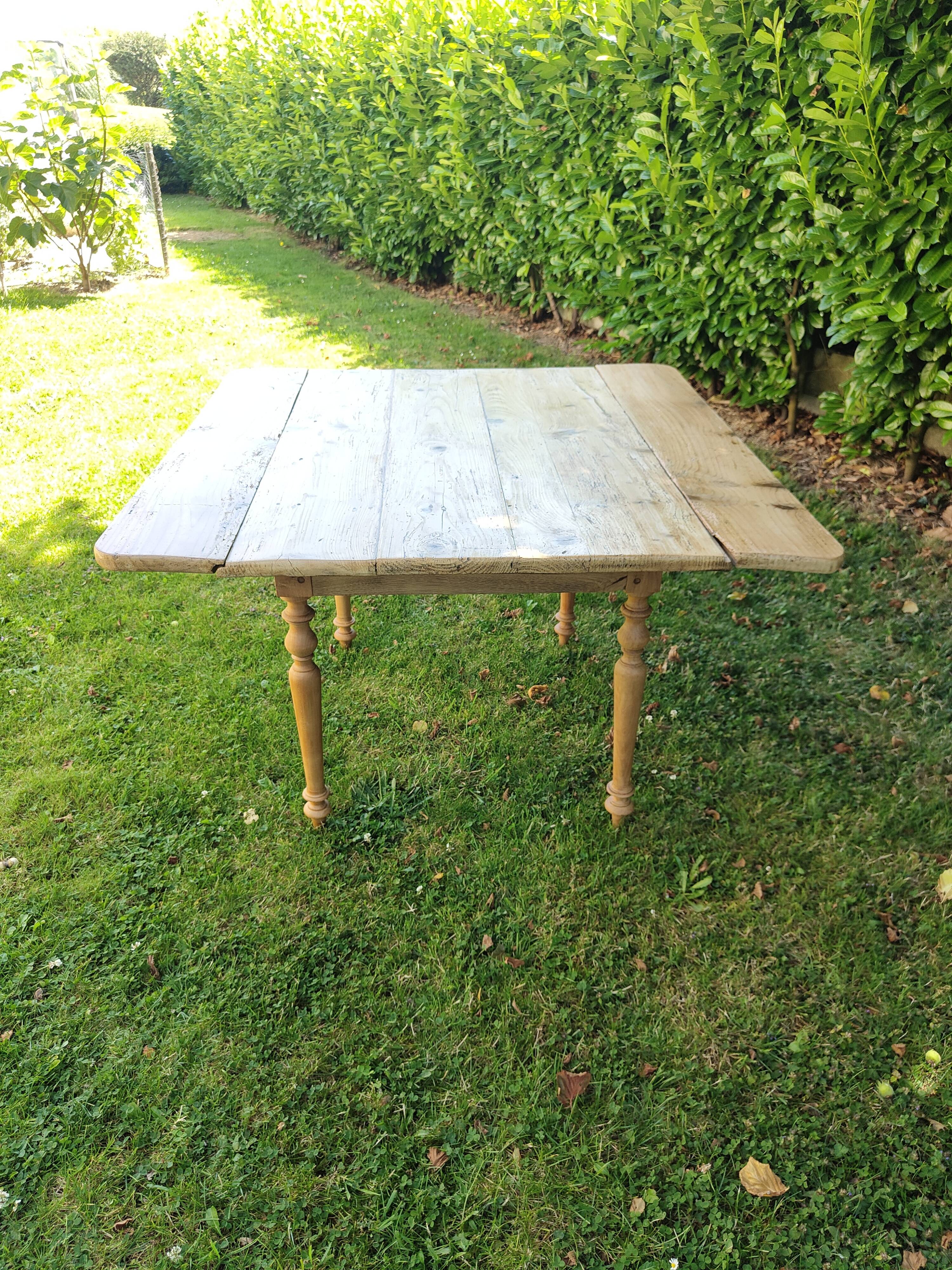 Wooden drop-leaf table