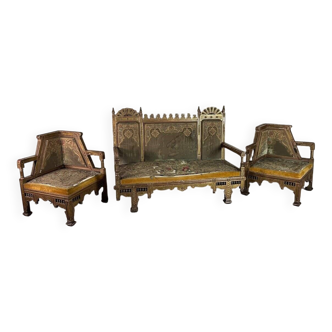 Pair of corner armchairs and an Orientalist bench in carved and polychrome wood from around 1900.