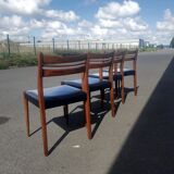 Scandinavian chairs in teak and black skaï.