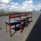 Scandinavian chairs in teak and black skaï.