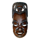 Enigmatic face of Africa carved in ebony wood
