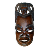 Enigmatic face of Africa carved in ebony wood