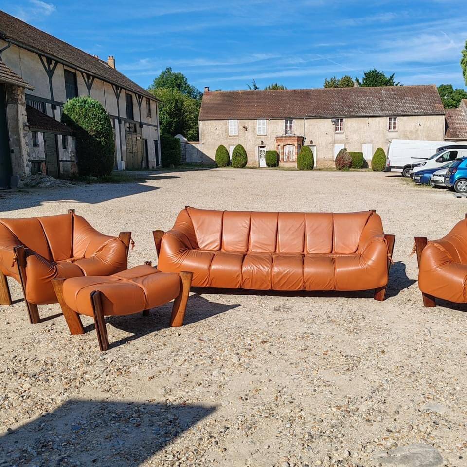 Percival lafer mp-211 sofa set with two armchairs and an ottoman in leather.