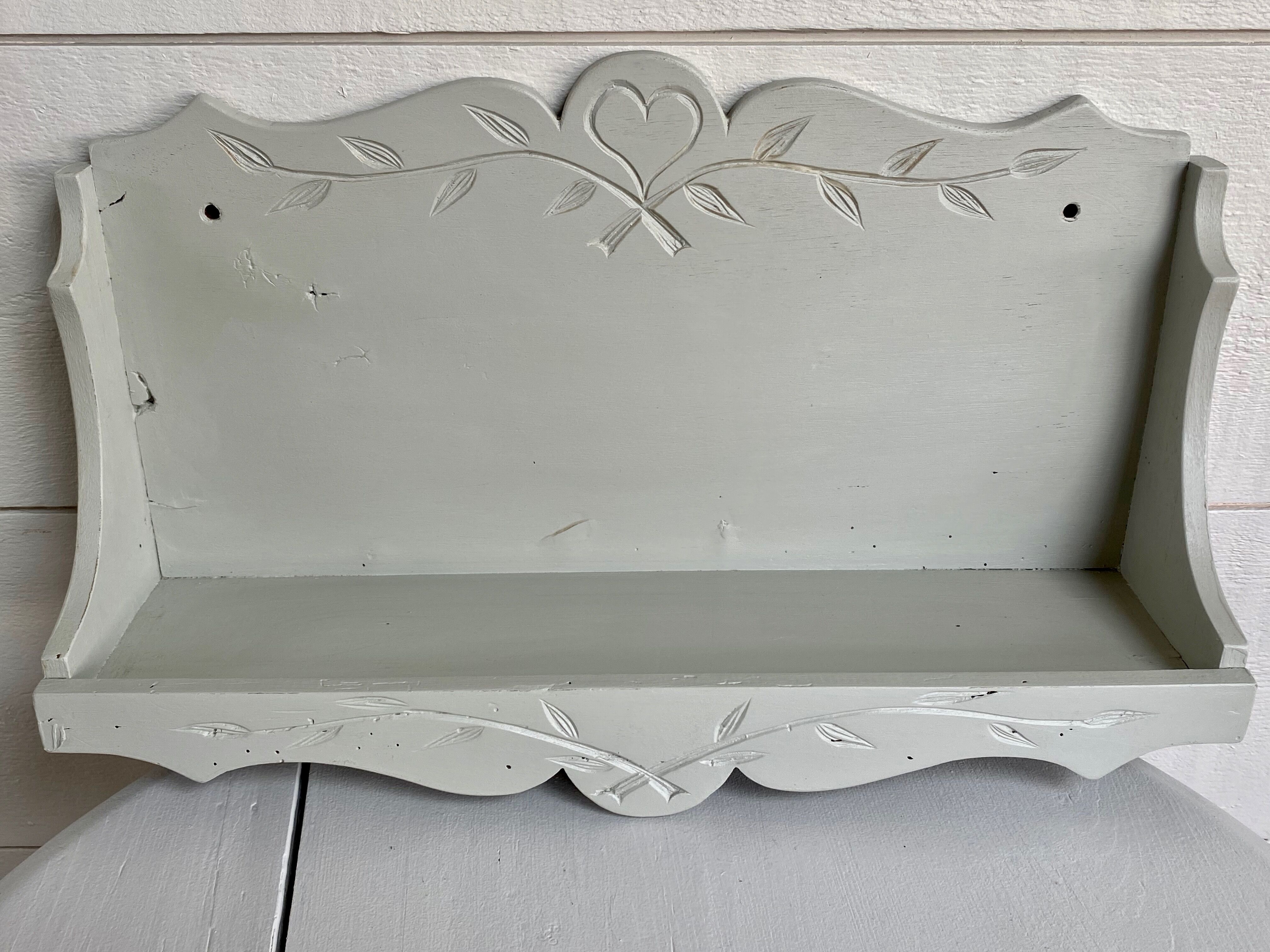 Scalloped wooden shelf