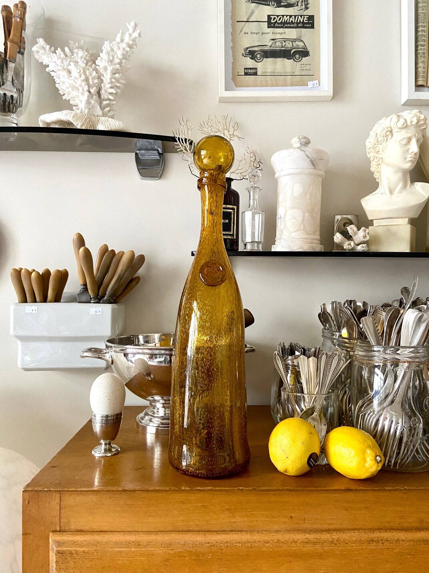 Biot "Narrow Bottle 45" in golden yellow bubbled glass