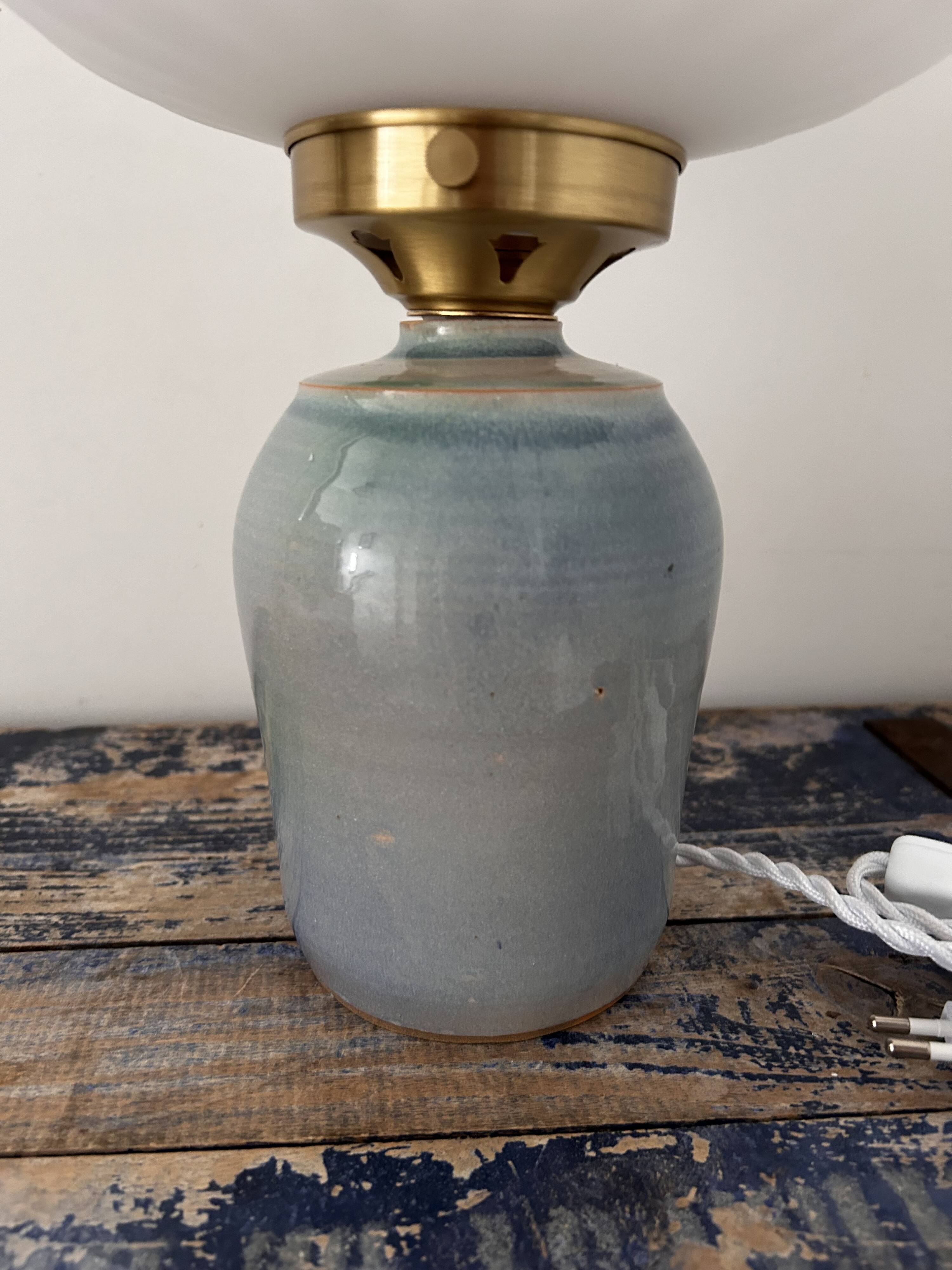 Table lamp in pastel blue and pleated opaline ceramic