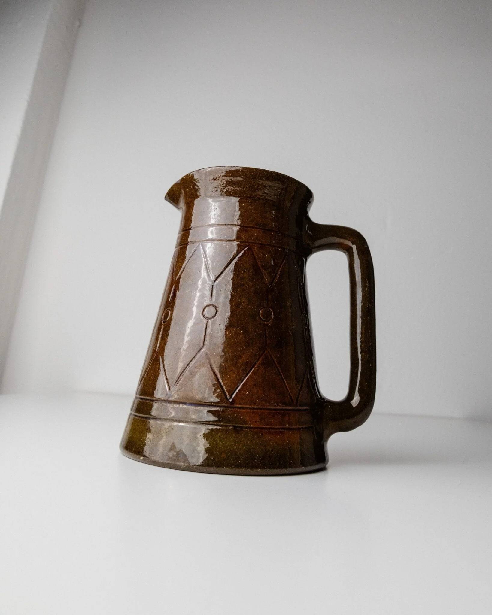 Vintage ceramic pitcher or vase with handle by Urbano Fontana, relief, brown glaze, Italy 1970s.