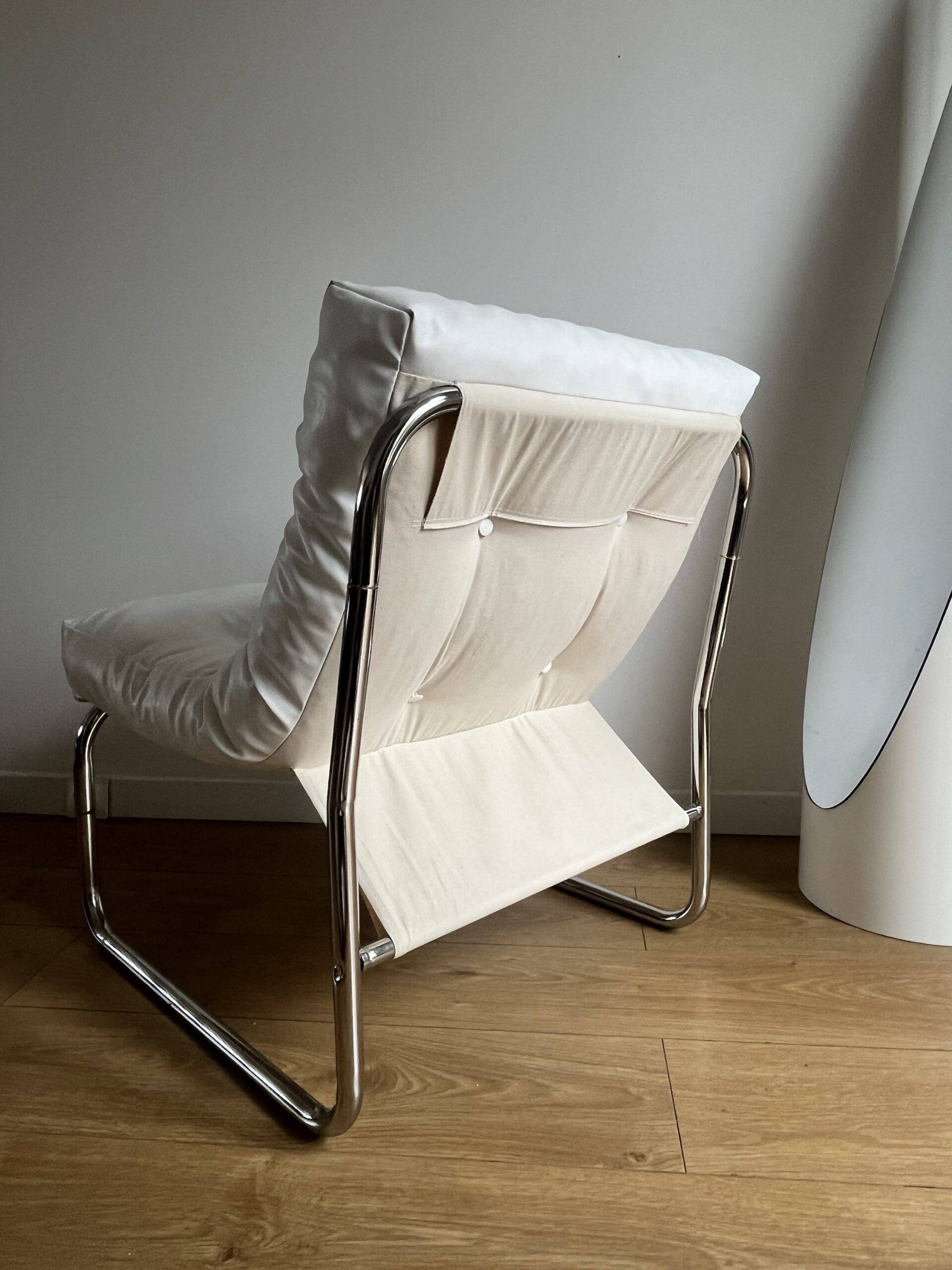 White faux leather armchair by Christian Koban for DOM edition