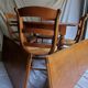 Round table, Louis Philippe style, antique patina, its 2 extensions and 4 chairs