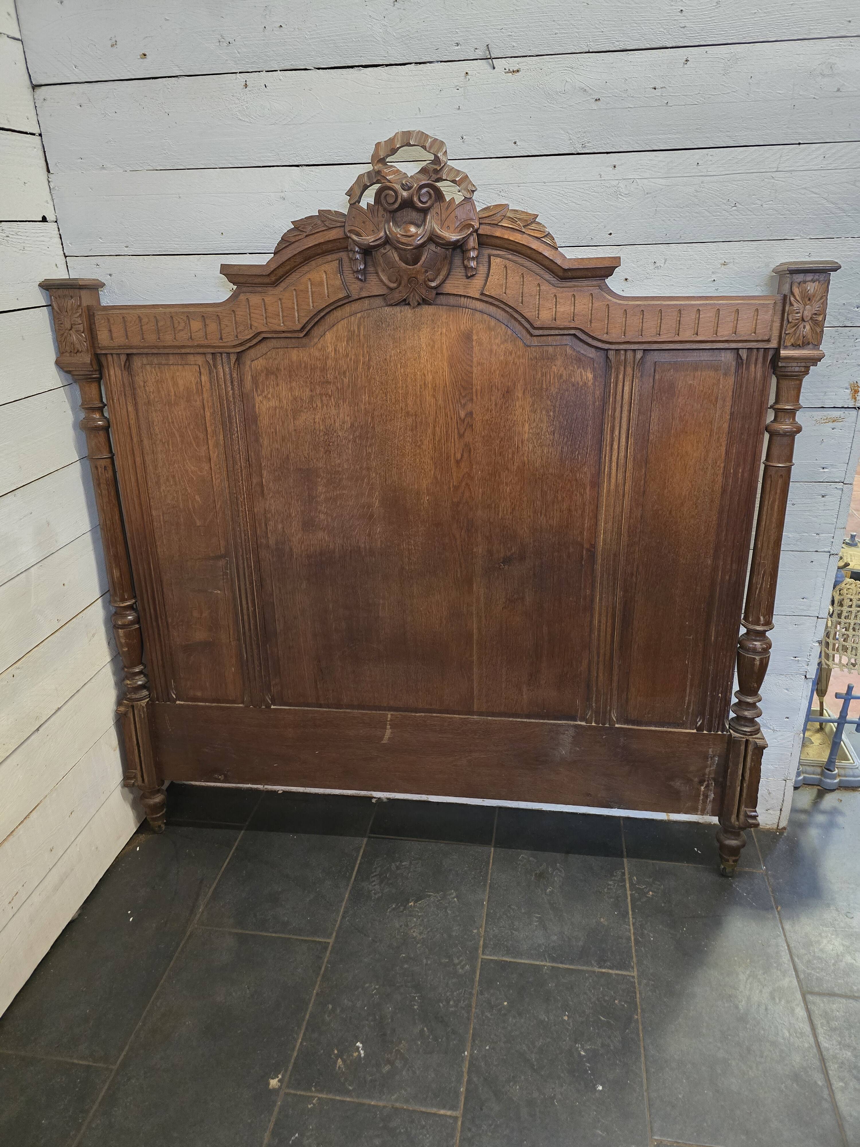 Antique oak headboard