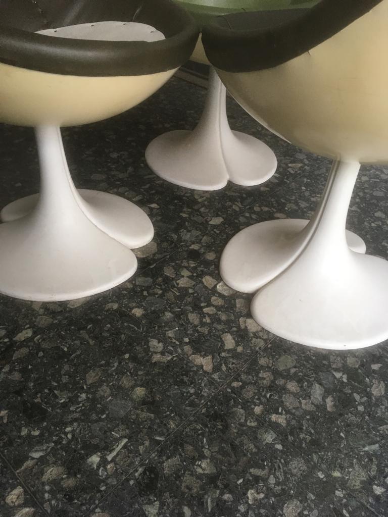 3 foot Tulip faux leather chairs.