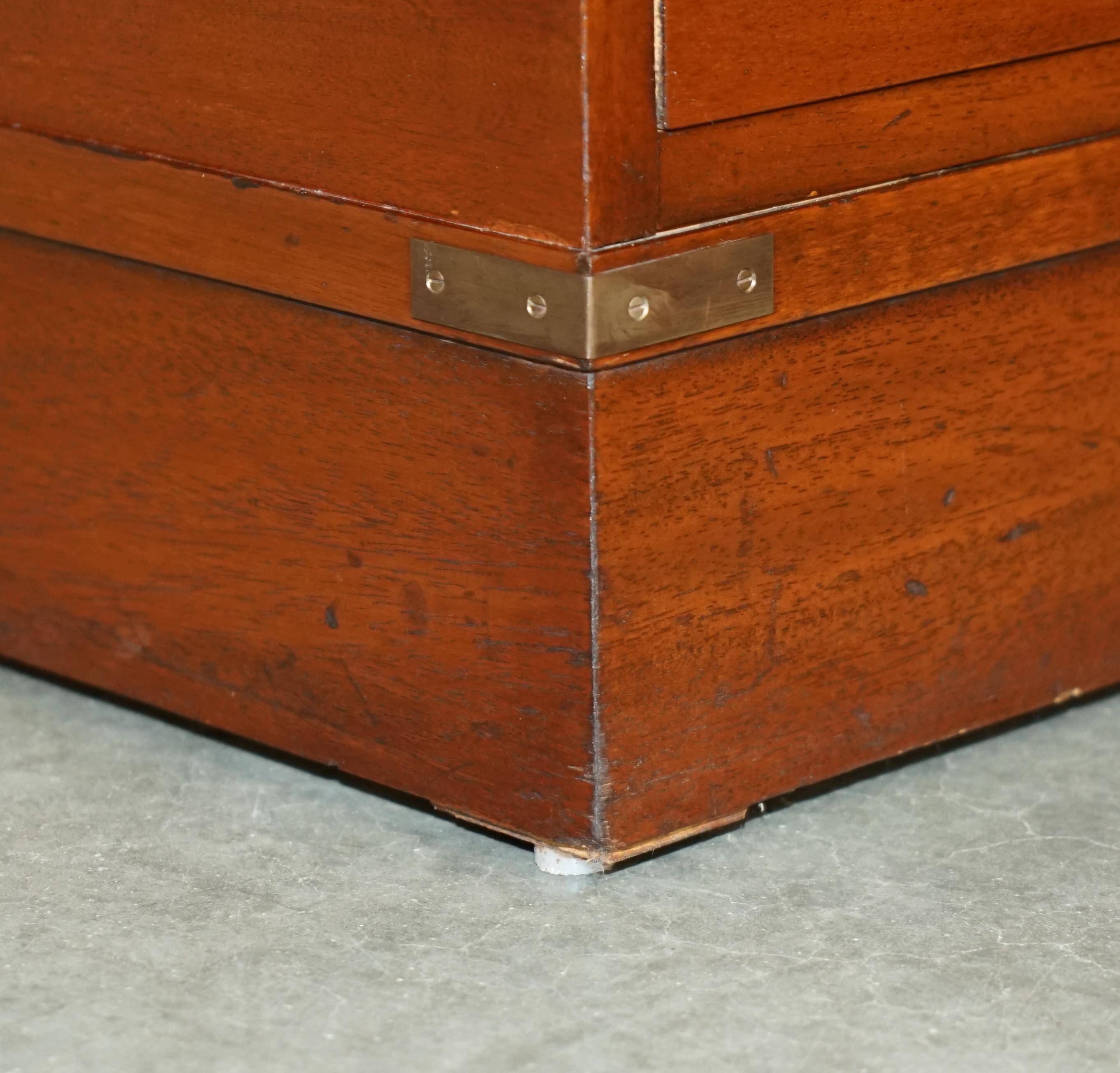 Vintage Harrods Kennedy desk in military campaign style with drawers.