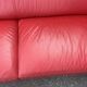 Three-seater red full-grain leather sofa – Vintage Italian design from the years.