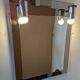 Vintage mirror with sconces.