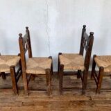Series of 4 brutalist rustic chairs in carved wood straw seat