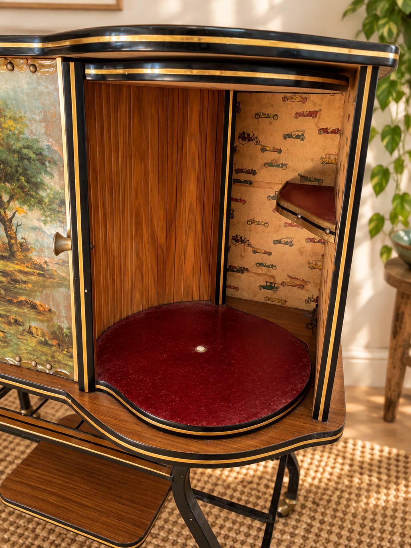 Vintage bar on wheels with tambour doors and painted decor – 1950s.