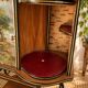 Vintage bar on wheels with tambour doors and painted decor – 1950s.