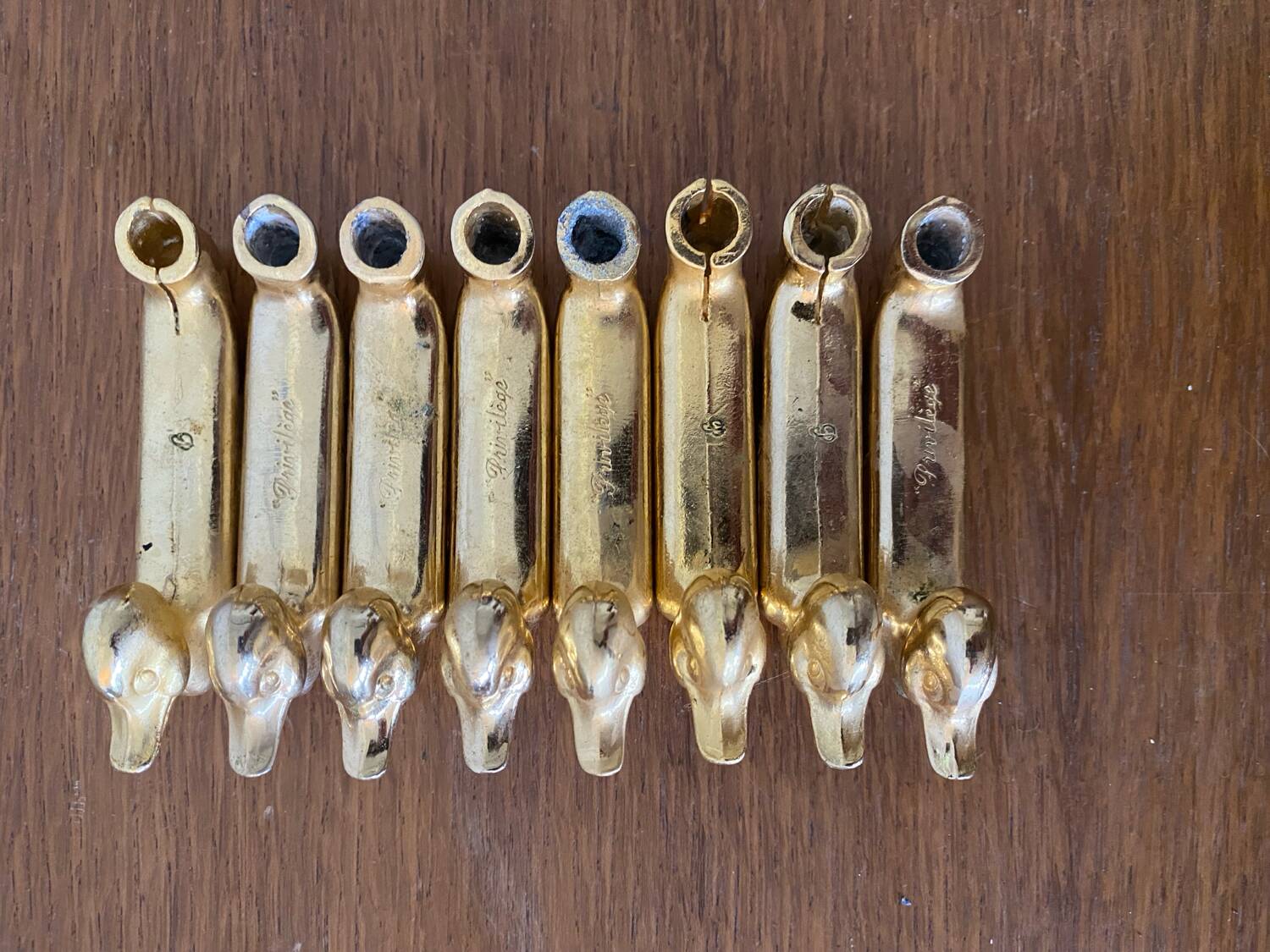 Set of 8 antique privilege knife holders gold metal duck vintage