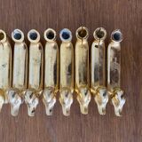 Set of 8 antique privilege knife holders gold metal duck vintage