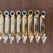 Set of 8 antique privilege knife holders gold metal duck vintage